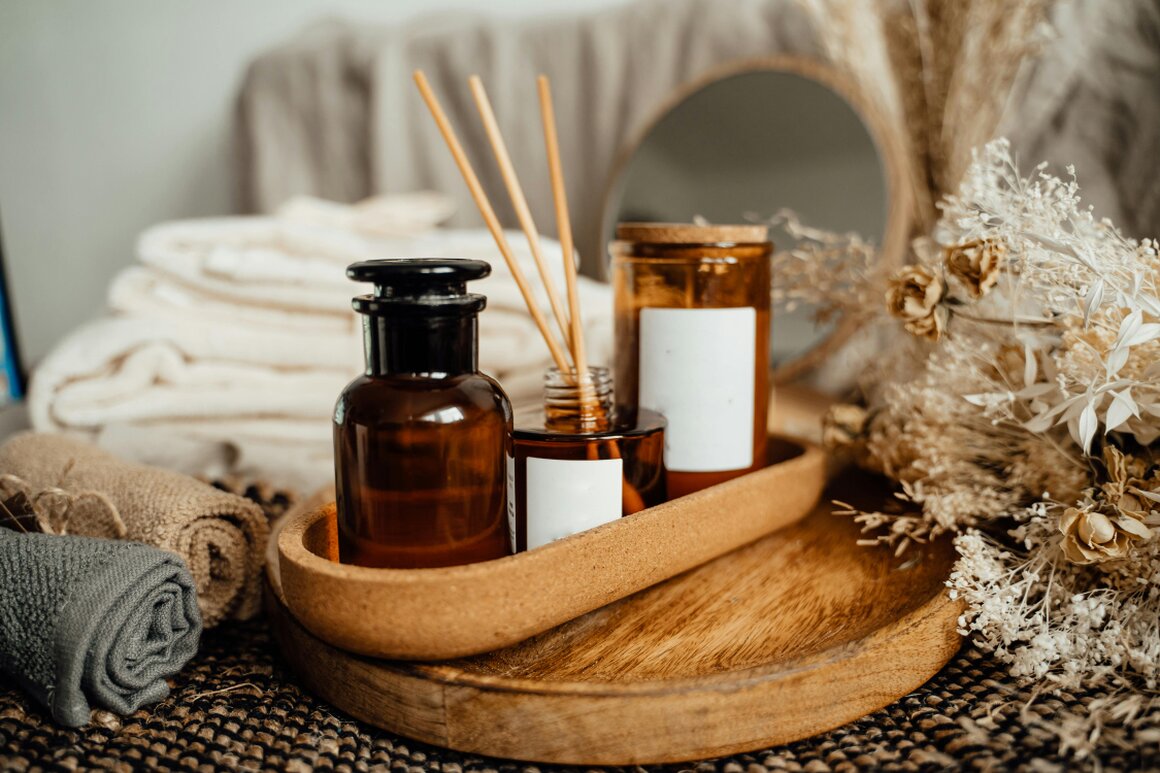 Calm holistic therapy room with towels and candles